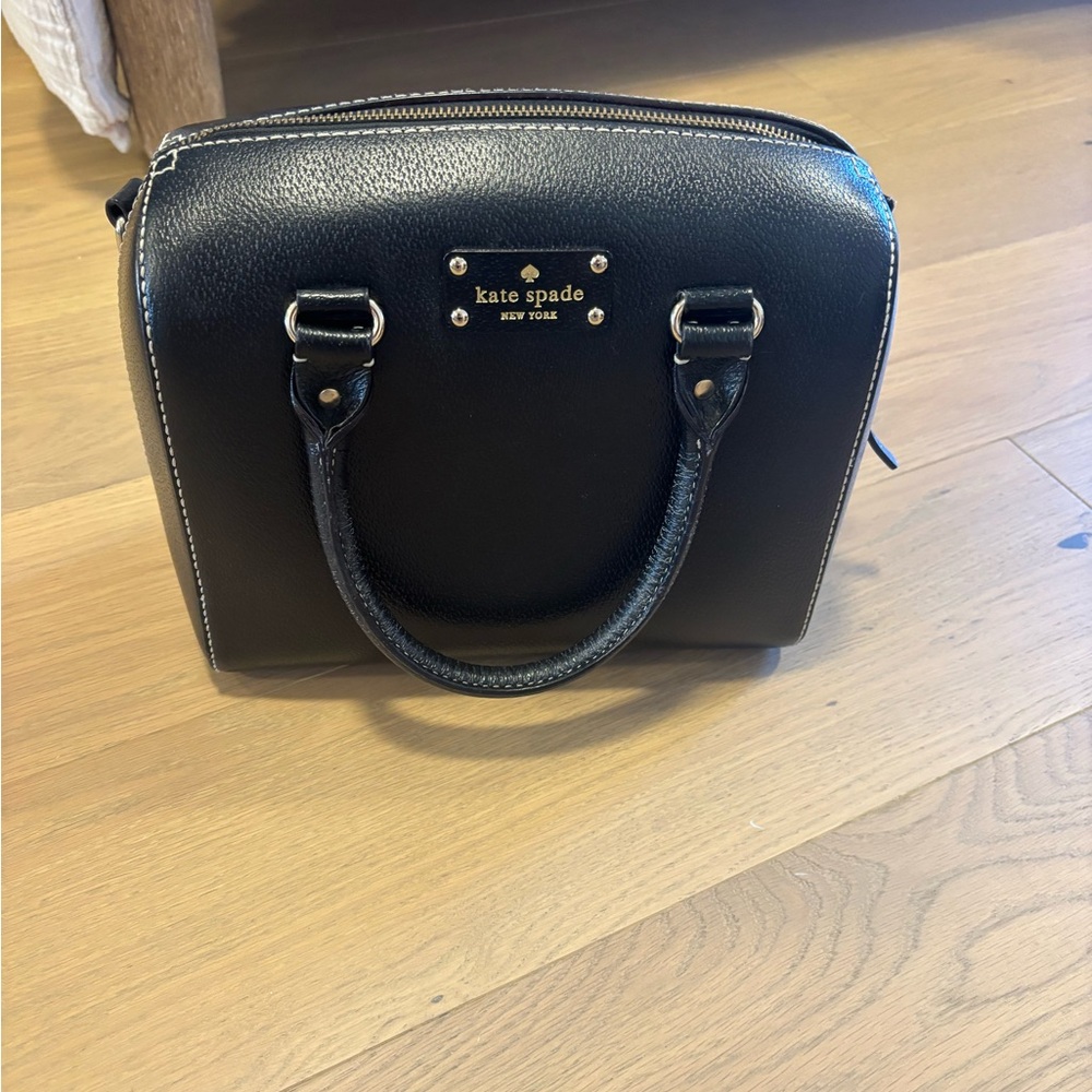 kate spade black leather satchel with gold-tone logo